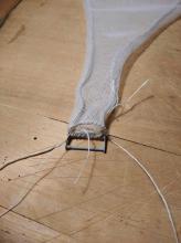 Konstrukce pro lana u vyprazdňovací​ho otvoru sítě