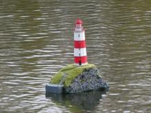 3D lama staví útes a papírový maják